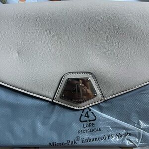 Nine West black/cream crossbody purse. New